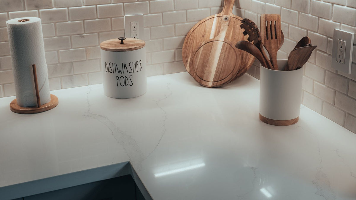 Paper towel roll on a holder on a modern kitchen counter